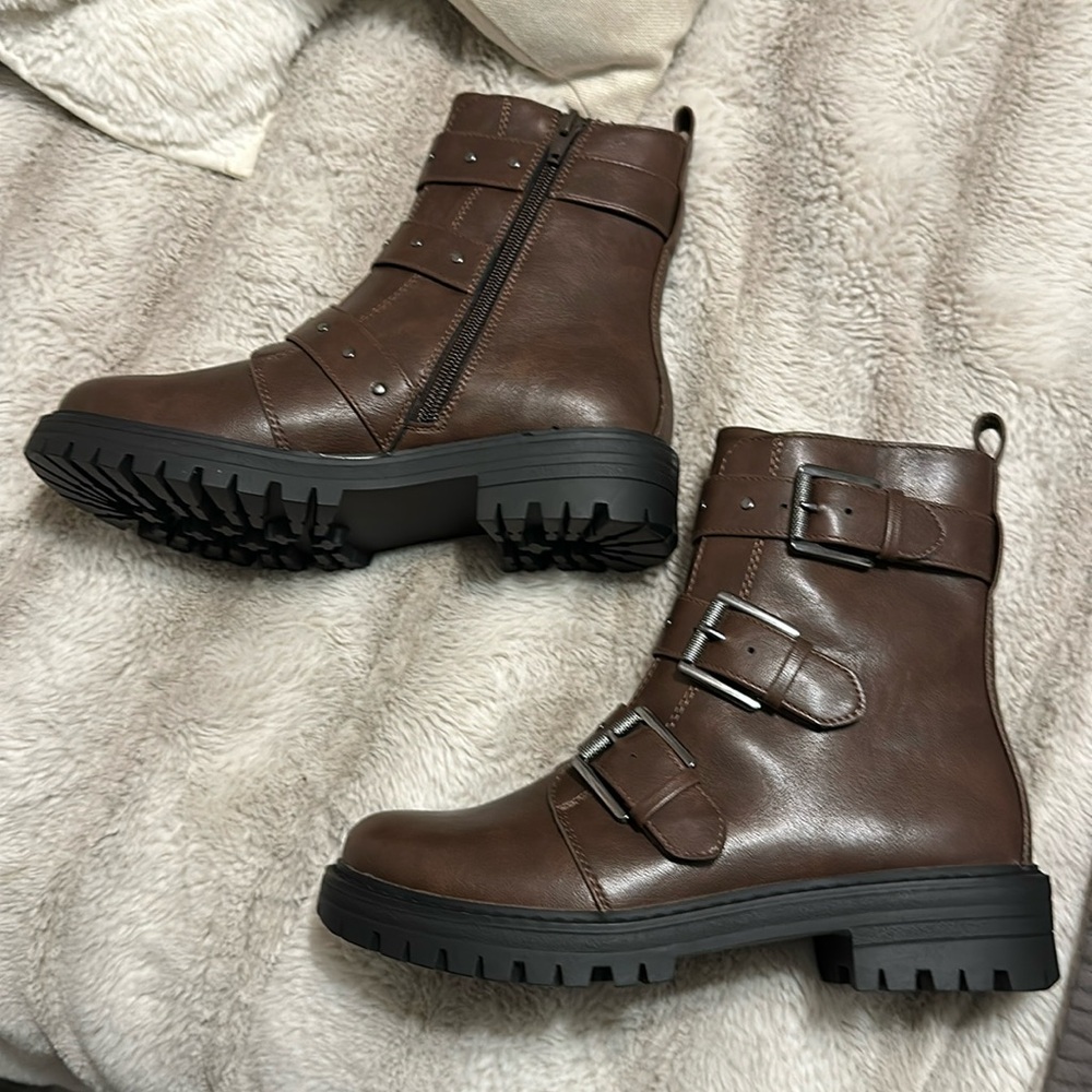 Brown boots with three pho buckles. Never worn.